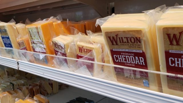 Wilton Cheese shelf of cheese